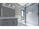 Modern bathroom featuring glass enclosed shower, contemporary vanity and fixtures at 115 W 2Nd Ave # 104, Denver, CO 80223