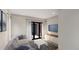 Cozy living room featuring contemporary furniture, a large window, and stylish decor at 115 W 2Nd Ave # 104, Denver, CO 80223