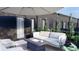 Inviting patio featuring stylish seating, modern design, and lush greenery, perfect for relaxation and outdoor enjoyment at 115 W 2Nd Ave # 104, Denver, CO 80223