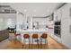 Bright, updated kitchen with a breakfast bar, modern appliances, and ample counter space for cooking at 7862 Stonedale Dr, Castle Pines, CO 80108