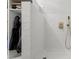 Mudroom area featuring storage and shower at 7862 Stonedale Dr, Castle Pines, CO 80108