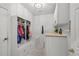 Functional mudroom with storage, a bench, and a laundry area, perfect for organization at 7862 Stonedale Dr, Castle Pines, CO 80108