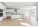 Modern kitchen featuring stainless steel appliances and an island with bar seating at 1840 Morgan Dr, Erie, CO 80516