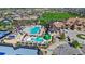 Stunning aerial view of community amenities including pool, tennis courts, lush landscaping, and well-maintained surroundings at 7790 S Queensburg Way, Aurora, CO 80016