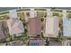 Overhead view of houses with mixed roof colors and backyard layouts at 7790 S Queensburg Way, Aurora, CO 80016