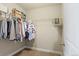 Walk-in closet featuring wire shelving and ample storage space at 7790 S Queensburg Way, Aurora, CO 80016