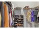 Well-organized closet featuring shelving, hanging rods, and a shoe rack to keep belongings tidy and accessible at 7790 S Queensburg Way, Aurora, CO 80016