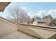 Balcony view of neighborhood homes with trees at 11285 Ranch Pl, Denver, CO 80234
