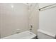Bathroom with tiled shower, bathtub and toilet at 11285 Ranch Pl, Denver, CO 80234