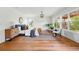Spacious main bedroom featuring hardwood floors and large windows at 2391 Hudson St, Denver, CO 80207