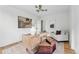 Bright home office with a wooden desk, stylish decor, hardwood floors, and natural light at 2391 Hudson St, Denver, CO 80207