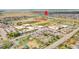 Aerial view showcasing proximity to local schools, sports fields, and neighborhood amenities at 56375 E 22Nd Pl, Strasburg, CO 80136