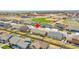 Aerial view of the property highlighting its location within a residential neighborhood at 56375 E 22Nd Pl, Strasburg, CO 80136