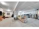 Spacious basement area featuring a comfortable seating area and ample storage space at 56375 E 22Nd Pl, Strasburg, CO 80136