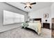 Sunlit bedroom with a large window and carpeted floors, creating a cozy atmosphere at 56375 E 22Nd Pl, Strasburg, CO 80136