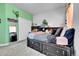 An eclectically designed room that features colorful accents and decorations at 56375 E 22Nd Pl, Strasburg, CO 80136