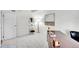 Bright office features a large desk, a white shelving unit, and minimalist décor at 8060 E Girard Ave # 311, Denver, CO 80231
