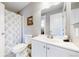 Clean bathroom with white vanity and decorative shower curtain at 18274 W 58Th Pl # 37, Golden, CO 80403