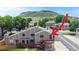 Charming townhome with a private entrance, mature trees, and mountain views at 18274 W 58Th Pl # 37, Golden, CO 80403
