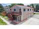 Townhouse with a deck, garage, and lawn at 18274 W 58Th Pl # 37, Golden, CO 80403
