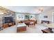Inviting living room features a cozy fireplace and lots of natural light at 18274 W 58Th Pl # 37, Golden, CO 80403