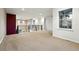 Spacious loft area with railing overlooking the living room at 15377 W Iliff Dr, Denver, CO 80228