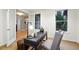 Bright office offers natural light, modern desk, chair, and french doors at 15377 W Iliff Dr, Denver, CO 80228