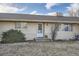 Home featuring a front entrance with a well-kept lawn and stone accents on exterior at 754 Highway 86 Hwy, Elizabeth, CO 80107