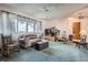 Comfortable living room with a ceiling fan, a large window, and a traditional decor at 754 Highway 86 Hwy, Elizabeth, CO 80107