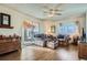 Inviting living room with hardwood floors, comfortable seating, and sliding glass doors leading to outdoor space at 754 Highway 86 Hwy, Elizabeth, CO 80107