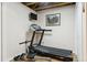 Basement gym area with treadmill and workout equipment, offering space for fitness at 13106 W Chenango Ave, Morrison, CO 80465
