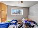 Bedroom features a window for natural light at 15640 E Eldorado Dr, Aurora, CO 80013