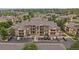Attractive condo building with a parking lot and balconies nestled within lush landscaping and mature trees at 7413 S Quail Cir # 1435, Littleton, CO 80127