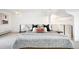Bright bedroom featuring a plush bed, stylish decor, and a peaceful ambiance at 3249 W Fairview Pl # 207, Denver, CO 80211