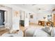 Spacious living room with hardwood floors and modern decor, offering a welcoming atmosphere at 3249 W Fairview Pl # 207, Denver, CO 80211
