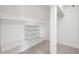 Spacious walk-in closet features shelving, plenty of storage space at 3249 W Fairview Pl # 207, Denver, CO 80211