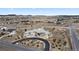Expansive aerial view of a luxury home surrounded by sprawling land at 19205 Sixpenny Ln, Monument, CO 80132