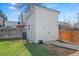 Charming backyard storage shed with double doors and a clean, well-maintained exterior at 19792 E Bates Dr, Aurora, CO 80013