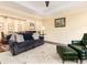 Comfortable living room showing a fireplace, hardwood floors, and neutral colors at 2552 E Alameda Ave # 16, Denver, CO 80209
