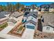 Aerial view of a home with solar panels and fenced yard in a new residential development at 668 Sage Forest Ln, Monument, CO 80132