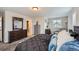 A view from the main bedroom featuring soft carpet, natural light, and sleek furnishings for a calming retreat at 668 Sage Forest Ln, Monument, CO 80132
