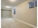 Finished basement featuring carpet and a daylight window at 4723 S Pagosa Way, Aurora, CO 80015