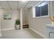 Functional basement laundry area with a window and neutral decor at 4723 S Pagosa Way, Aurora, CO 80015