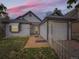 Charming single-Gathering home with a well-maintained front yard and a detached garage with a white picket fence at 4723 S Pagosa Way, Aurora, CO 80015