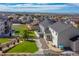 Aerial view of a neighborhood with well-maintained yards and mountain views at 6630 S Coolidge Ct, Aurora, CO 80016
