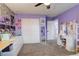 Well-lit bedroom with closet, vanity and mirror, providing a comfortable and functional living space at 6630 S Coolidge Ct, Aurora, CO 80016
