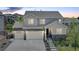 Beautiful two-story home featuring a three-car garage and charming stone accents, set in a desirable neighborhood at 6630 S Coolidge Ct, Aurora, CO 80016