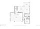Detailed floor plan of the first floor featuring the living room, kitchen, and garage at 6630 S Coolidge Ct, Aurora, CO 80016
