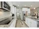 Beautiful kitchen with stainless steel appliances, granite countertops and wood flooring at 6630 S Coolidge Ct, Aurora, CO 80016