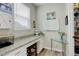 Bright office nook with granite countertop, built-in cabinets and natural light at 6630 S Coolidge Ct, Aurora, CO 80016